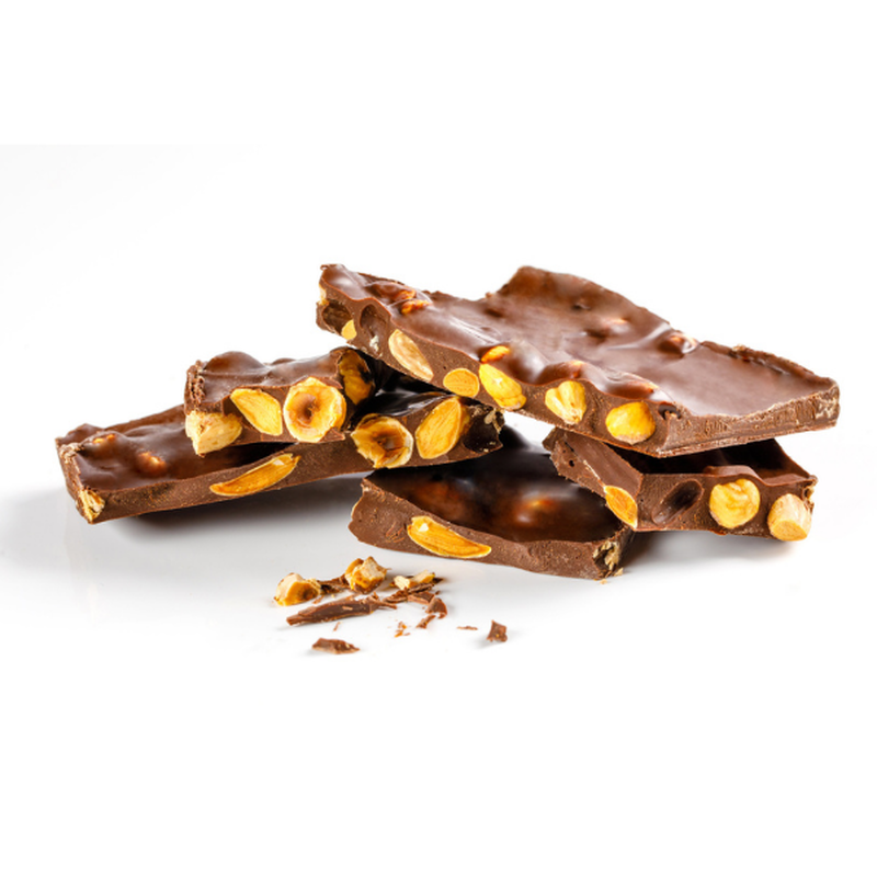 Stacked pieces of chocolate bark on white background. 